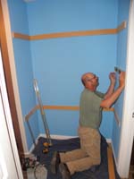 69-friend_from_work_John_Holmes_installing_shelves