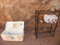 05-water_station-now_there_is_metal_shelf_for_extra_water_family_of_deceased_probably_deliver_regularly