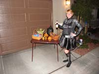 07-Mommy_is_ready_to_hand_out_lots_of_cany-she_has_her_beer