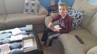 15-Kenny_helping_Mommy_putting_together_the_Christmas_cards