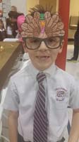 34-Kenny_and_his_Thanksgiving_eye_glasses_he_made_at_school