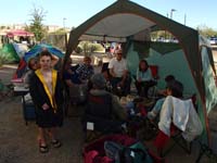 38-entire_group_hanging_out_under_our_tent