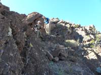 31-Greg_and_Kenny_heading_down_a_saddle_to_the_Point