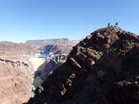34-group_on_peak_with_Hoover_Dam_in_background-from_Greg