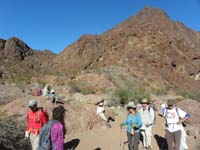 60-group_together_in_Gold_Strike_Canyon-our_peak_was_beyond_that_big_peak