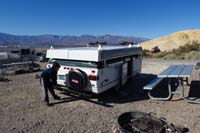 05-Kenny_helping_to_setup_the_pop-up_camper_at_campground