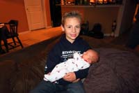 04-Kenny_holding_Luke-4_days_old-born_Nov_30