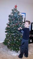 11-Kenny_decorating_the_tree_after_school-Daddy_is_at_work