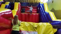 14-birthday_party_fun_at_Pump_It_Up-the_slide_to_left_was_where_Kenny_sprained_and_factured_foot