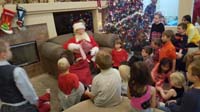 15-Santa_at_holiday_party_with_friends-Kenny_hobbled_a_lot_since_foot_hurt_a_lot