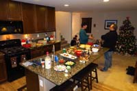 36-guys_hanging_out_on_second_floor_with_all_the_food