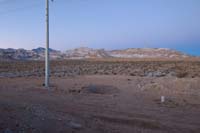 30-0636am-view_of_mountains_behind_house_from_rooftop_deck_10_min_before_sunrise-moon_has_set