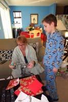 69-Mommy_opens_her_presents_from_Kenny-Daddy's_present_was_the_new_60_inch_TV