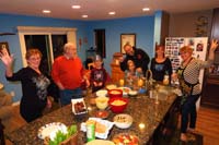02-New_Years_celebration_guests_and_spread_of_food