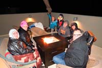 11-group_went_on_rooftop_deck_to_freeze_and_crowd_around_fire_pit