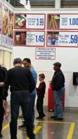 64-Kenny_in_snack_bar_line_at_Costco