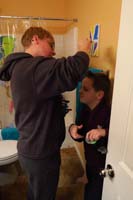 65-Mommy_getting_Kenny_ready_for_school-fixing_his_hair