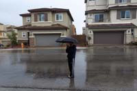 72-Kenny_likes_standing_in_the_rain,but_with_an_umbrella_in_flip-flops