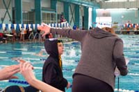 19-getting_instruction_from_Coach_Lindsey_for_the_butterfly