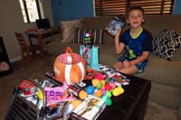 36-Kenny_is_happy_opening_the_gift_bag_from_Baba