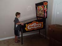29-Kenny_playing_pinball_machine_at_Grammy_and_Grandpa_Duke's_house