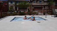 33-Kenny_and_Zoe_playing_in_community_hot_tub-Darby_and_Zoe_moved_into_our_house