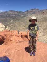 33-Kenny_with_Daddy_in_background-had_to_get_lid_that_blew_down-from_April