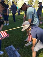 05-Daddy_got_to_use_the_'poker'_to_create_the_hole_so_Kenny_can_insert_the_flag