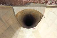 30-looking_down_into_tunnel-can_hear_water_from_spring_that_broke_through_concrete