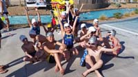 03-kids_from_his_team_excited_to_swim-Kenny_to_right_of_girls_in_center