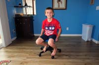 56-Kenny_likes_his_new_chair-he_outgrew_old_deck_and_chair