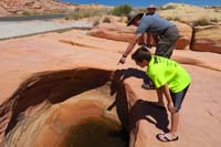 06-Poppy_and_Kenny_swear_they_see_a_big_toad_in_the_murky_water