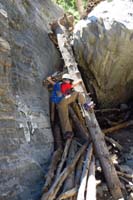 08-Kenny_and_Daddy_climbed_the_tree_stump-Kenny_needed_a_push_up