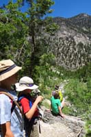 26-admiring_scenery-took_side_route_meant_to_avoid_large_snowpack_in_Winter