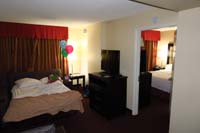 009-bedtime-Kenny_gets_sofa_bed_between_suites-Mommy_and_Daddy_to_right