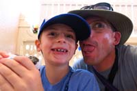 043-Daddy_tries_to_take_a_bite_of_Kenny's_treat