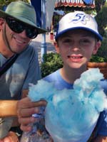061-Kenny_enjoys_the_cotton_candy-Daddy_steals_a_piece