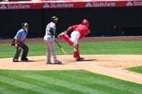 088-Angels_catcher_throws_ball_so_hard_and_moves_so_fast_his_helmet_comes_off_by_itself2