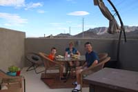 54-dinner_on_rooftop_deck-nice_temps_and_cloud_cover-odd_for_July