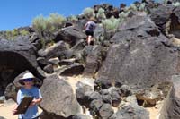 25-Kenny_working_on_his_Junior_Ranger_program_while_Mommy_checks_out_petroglyphs