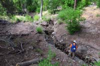 016-Frijoles_Creek-downstream-Kenny_checking_out_stream-evidence_of_past_flood
