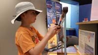065-Kenny_playing_a_brain_game_at_Bradbury_Science_Museum-Los_Alamos_National_Laboratory