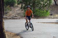 081-riding_his_bike_as_part_of_the_obstacles_course-he's_back_2_minutes_later