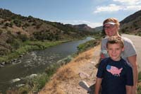 01-Mommy_and_Kenny_with_pretty_Rio_Grande_River_scenery_along_NM_Hwy_68
