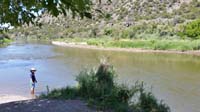 04-Kenny_has_his_feet_in_the_Rio_Grande_River-picnic_and_water_play_waiting_for_raft_time
