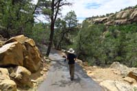 089-Kenny_walking_on_the_trail-exposed_terrain