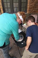 163-Mommy_and_Kenny_working_hard_to_put_a_piece_of_pottery_back_together_with_tape