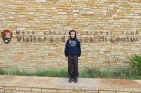 165-next_morning-Kenny_shows_off_his_Mesa_Verde_NP_Junior_Ranger_badge_at_Visitor_Center-now_off_to_Hovenweep_NM