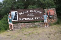 002-family_at_Black_Canyon_of_the_Gunnison_NP_entrance_sign