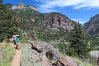 21-scenic_view_looking_back_with_Mommy_and_Kenny_on_trail